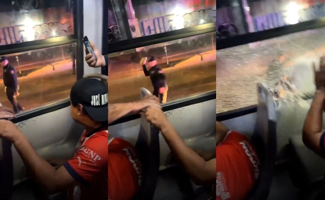 Elemento de la policía de Zapopan agrediendo a aficionados de Chivas / FOTO: Capturas