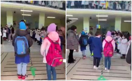 Dan a niños ucranianos refugiados en Italia emotiva bienvenida en escuela