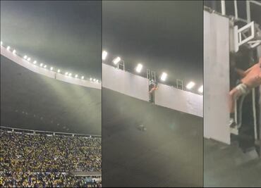 Aficionado del América festeja el campeonato en el techo del estadio Azteca poniendo en riesgo su vida