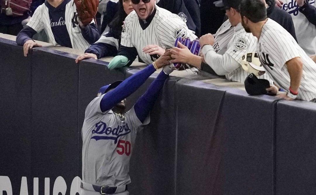 Los aficionados de los Yankees hacen todo lo posible por que el juego no lo ganen los Dodgers. Foto: Imgo7.
