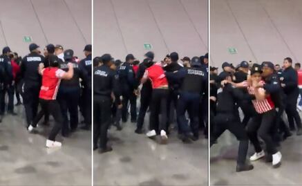 Aficionado de Chivas perdió la cabeza tras el Clásico y golpeó por la espalda a un policía