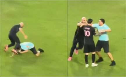 El guardaespaldas de Lionel Messi fue tacleado por un aficionado que invadió el terreno de juego