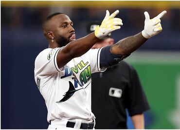 Randy Arozarena reta a su amigo AMLO a un partido en noviembre