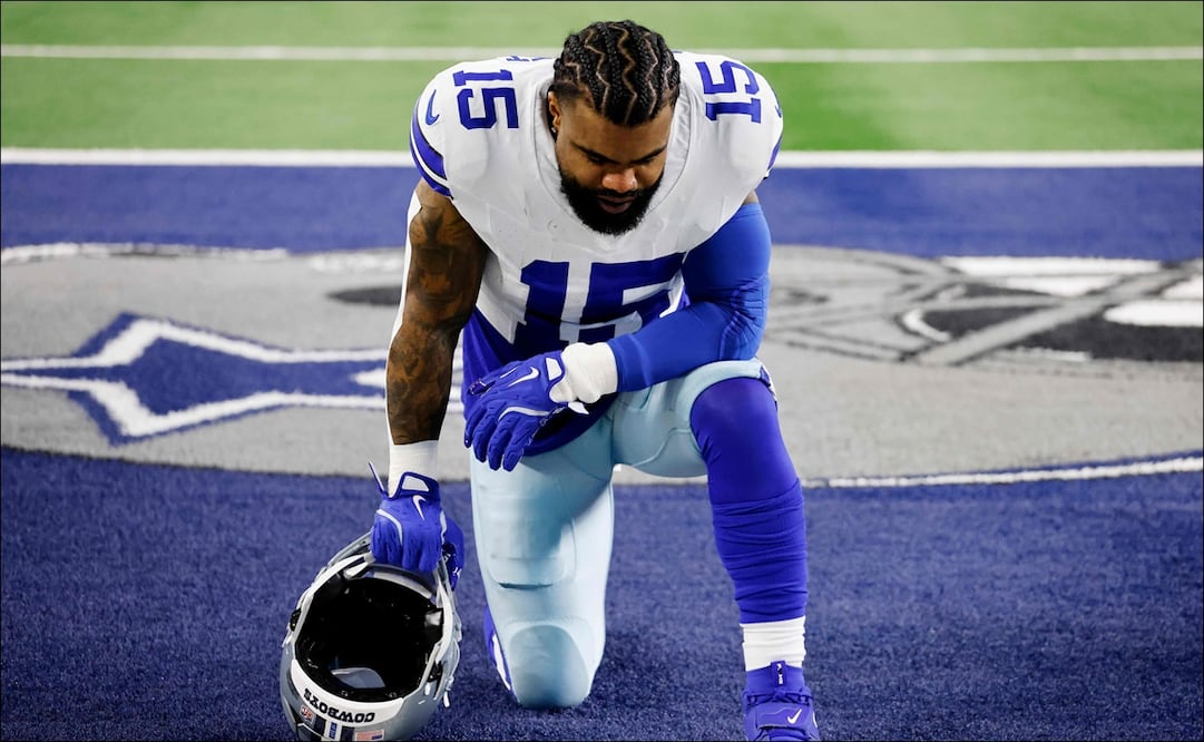 Ezekiel Elliott (15) de los Dallas Cowboys clava la mirada en el césped previo al duelo ante Tampa Bay Buccaneers en el AT&T Stadium. FOTO: AFP