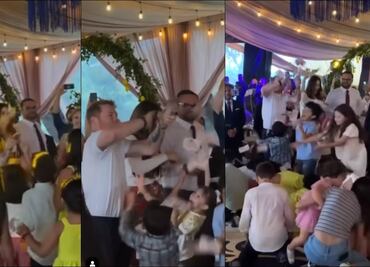 Saúl Álvarez y su esposa se lucieron como padrinos en un bautizo al lanzar bolo de puros billetes