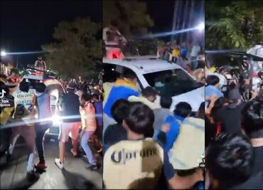 Aficionados del América sacuden camioneta de la policía durante los festejos por el Bicampeonato
