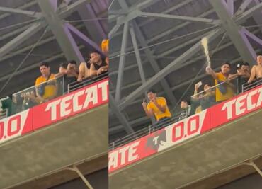 Aficionado de Tigres fue captado orinando en vaso y aventarlo a gente de Rayados