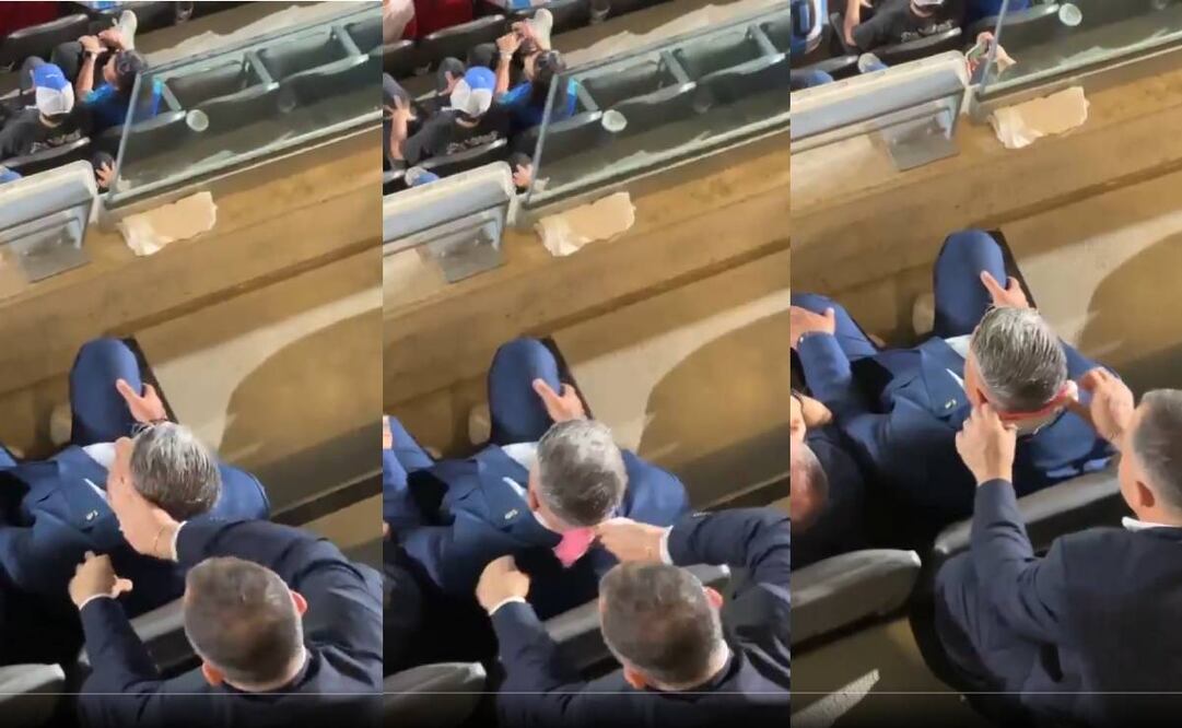 Chiqui Tapia estaba concentrado viendo el partido de Argentina mientras le limpiaban el sudor de la cabeza. Foto: Especial