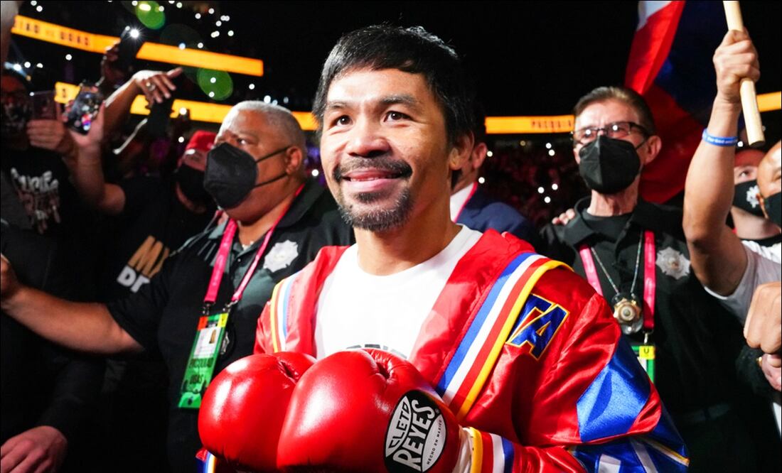 Manny Pacquiao camina hacia el encordado antes de una pelea. FOTO: Especial