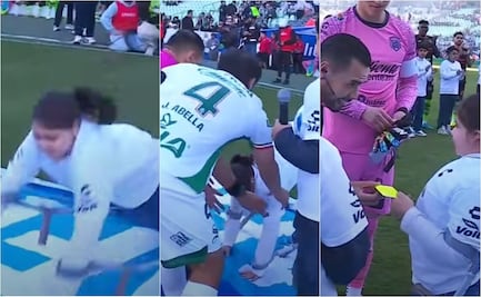 Niña se cae en el partido de Santos vs Juárez, recibe ayuda de jugadores y un regalo de 'El Gato' Ortiz