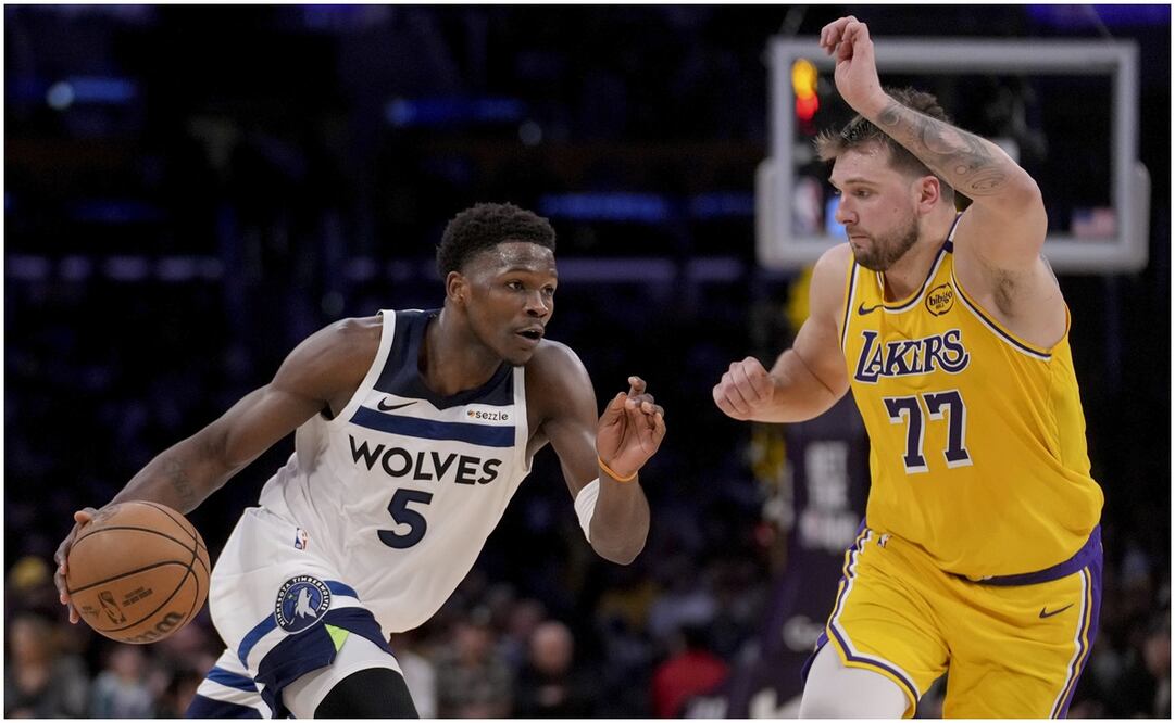 Anthony Edwards y Luka Doncic Foto:AP